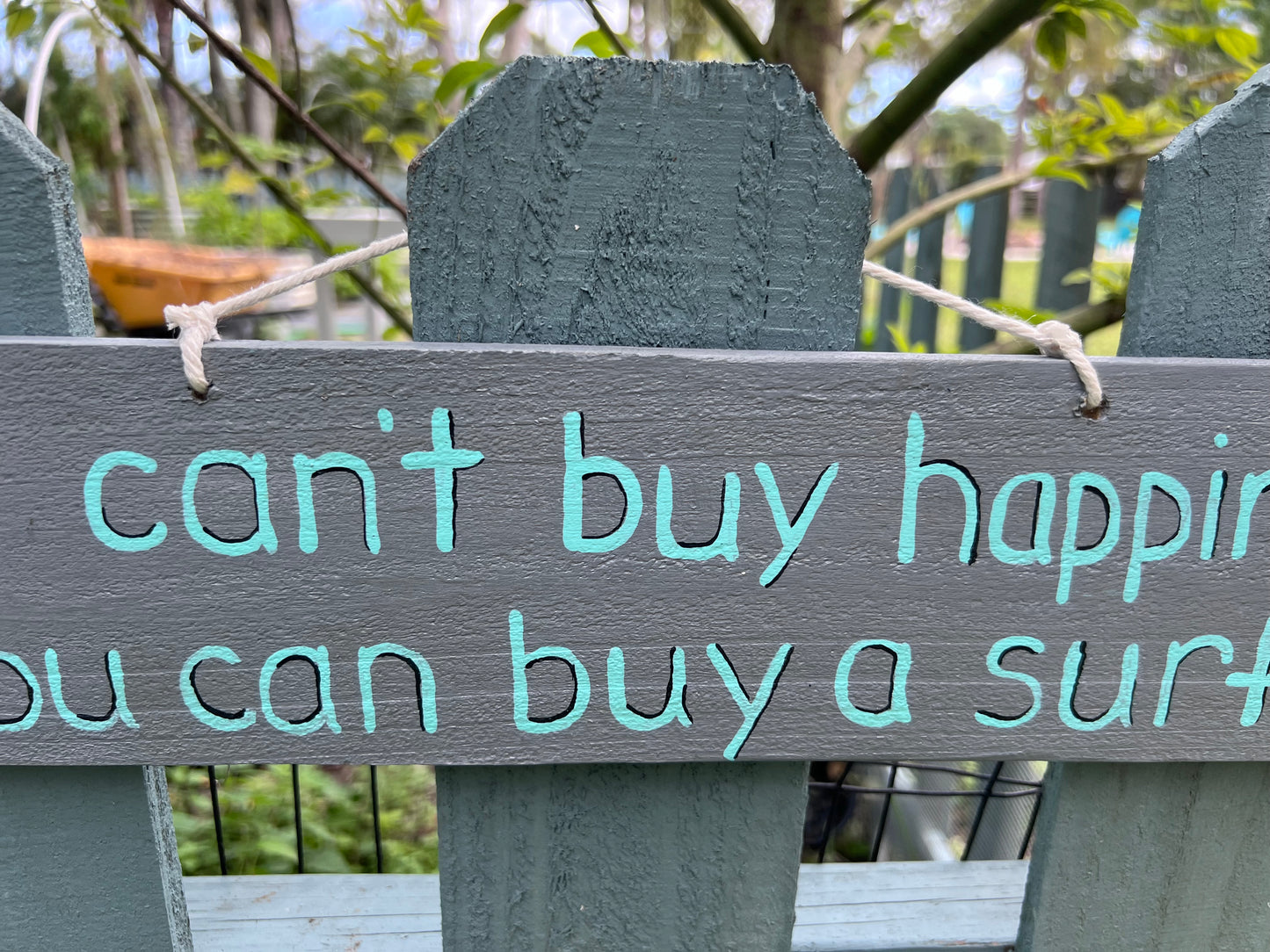 You can’t buy happiness, but you can buy a surfboard Wood Sign