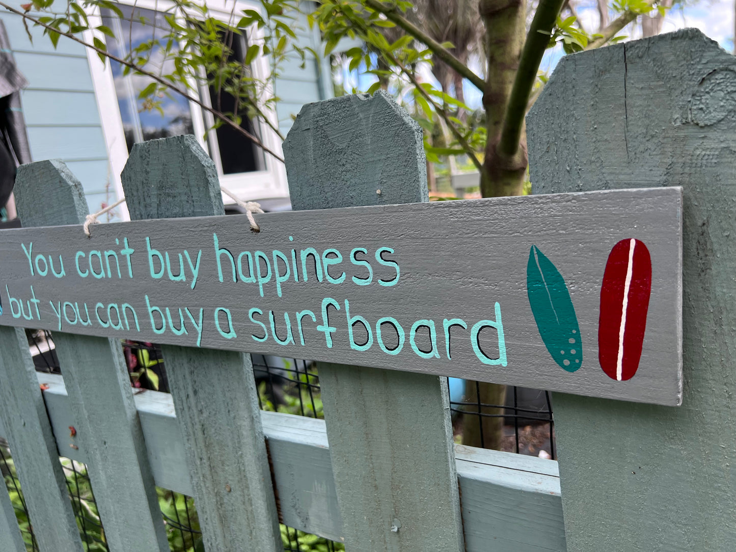 You can’t buy happiness, but you can buy a surfboard Wood Sign